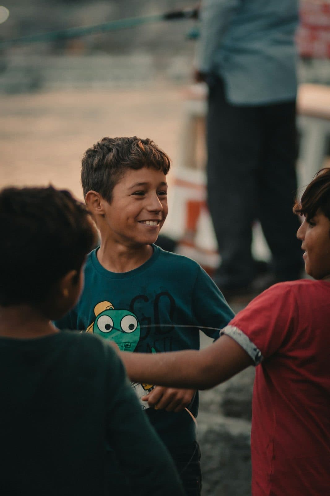 Child smiling outdoors